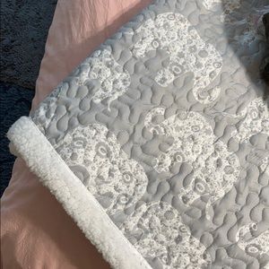 LUSH brand elephant quilted serpia throw